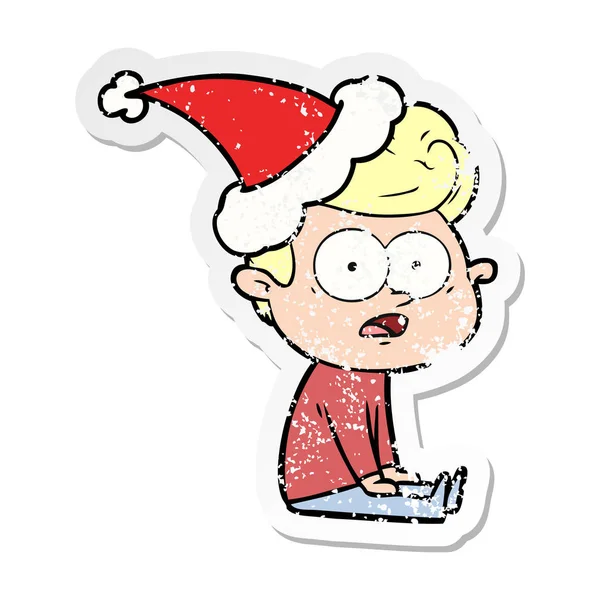 Distressed sticker cartoon of a staring man wearing santa hat — Stock Vector