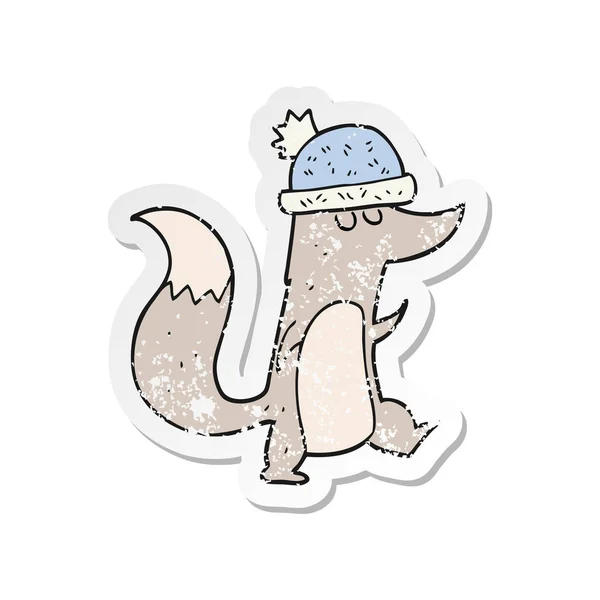 Pegatina retro angustiado de un pequeño lobo de dibujos animados con sombrero — Vector de stock