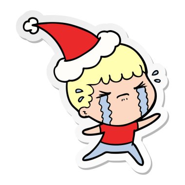 etiket karikatür giyen Noel Baba şapkası ağlıyor bir adamın el çekilmiş