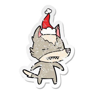 sıkıntılı etiket karikatür Noel Baba şapkası giyen diş gösterilen kurt el çekilmiş