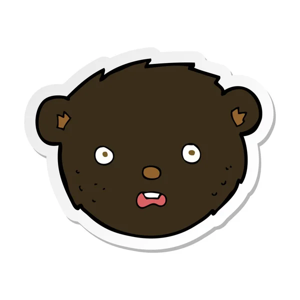 Sticker of a cartoon black bear face — Stock Vector