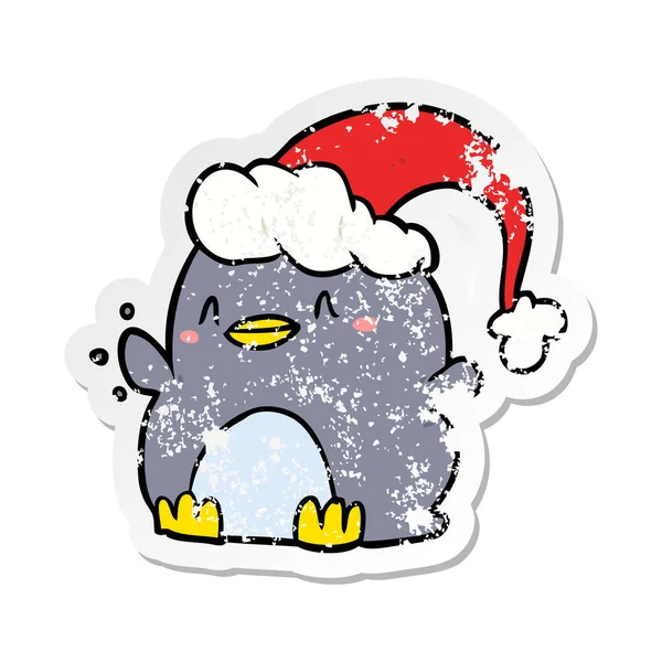 Distressed Sticker Cartoon Penguin Wearing Christmas Hat — Stock Vector