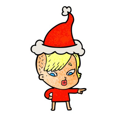 el giyen Noel Baba şapkası işaret sürpriz bir kızın dokulu çizgi film çekilmiş