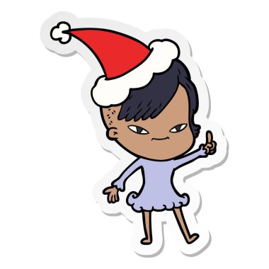 şirin el etiket karikatür bir kızın santa şapka hipster saç kesimi ile çekilmiş.