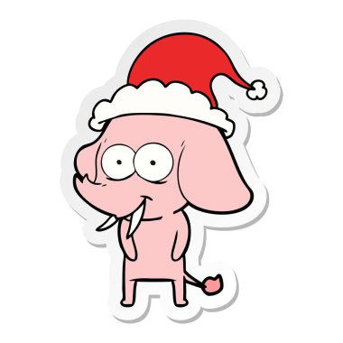 mutlu etiket karikatür Noel Baba şapkası giyen bir fil