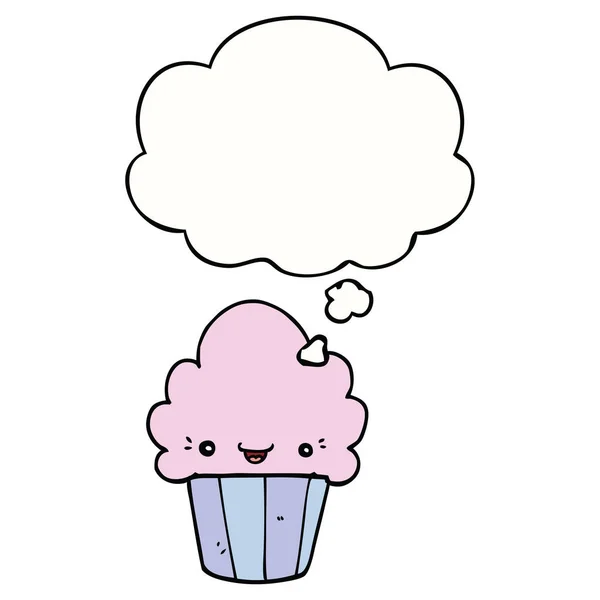 Cartoon-Cupcake mit Gesicht und Gedankenblase — Stockvektor