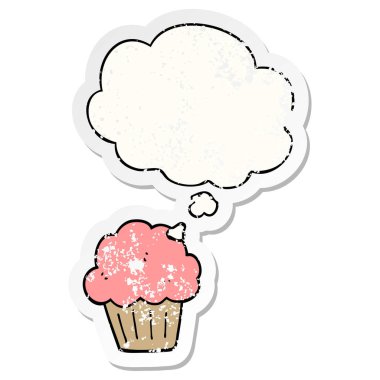karikatür muffin ve sıkıntılı yıpranmış etiket olarak kabarcık düşünce