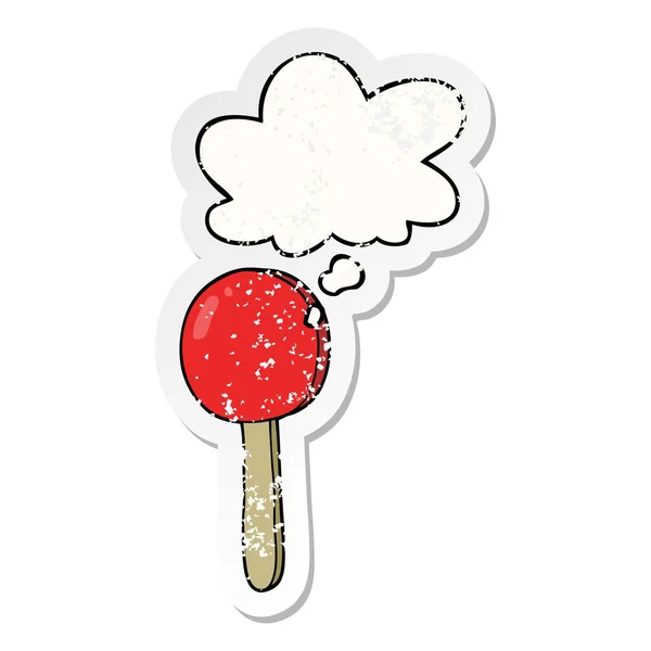 Cartoon Lollipop en dacht Bubble als een verdrietig versleten sticker — Stockvector