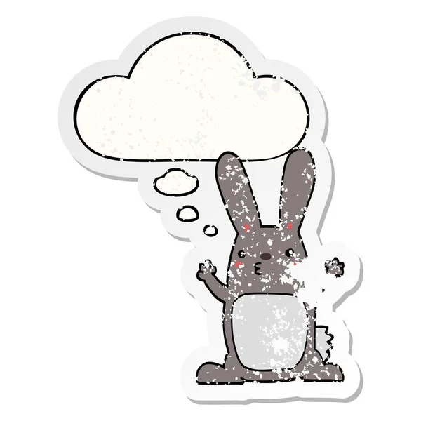 Conejo de dibujos animados y burbuja de pensamiento como una pegatina desgastada angustiada — Archivo Imágenes Vectoriales