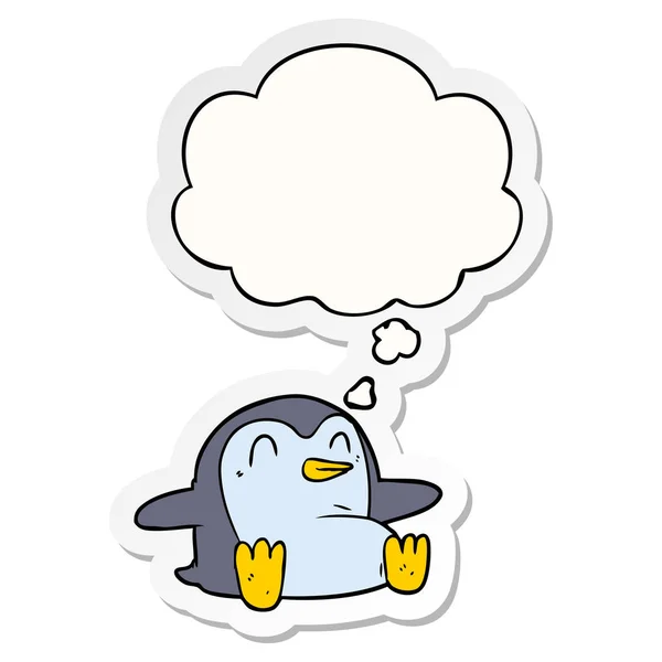 Cartoon penguin and thought bubble as a printed sticker — Stock Vector