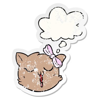 karikatür kedi yüz ve sıkıntılı yıpranmış etiket olarak kabarcık düşünce