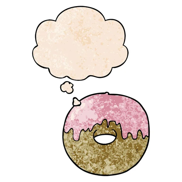 Cartoon donut en dacht bubble in grunge textuur patroon stijl — Stockvector