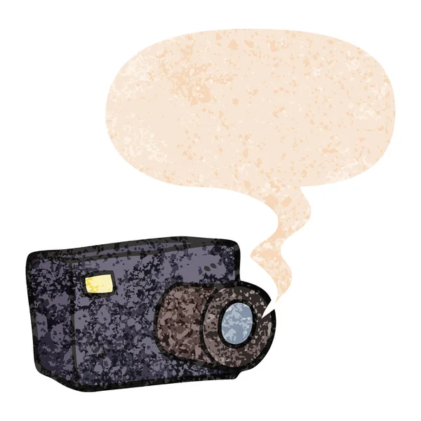 Caméra de dessin animé et bulle de parole dans un style texturé rétro — Image vectorielle