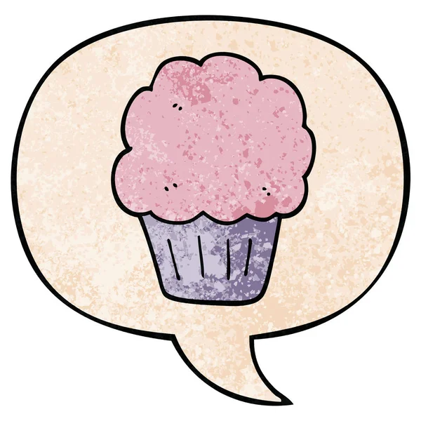 Cartoon cupcake and speech bubble in retro texture style — Stock Vector