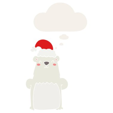 karikatür ayı retro s noel şapkası ve düşünce balonu giyen