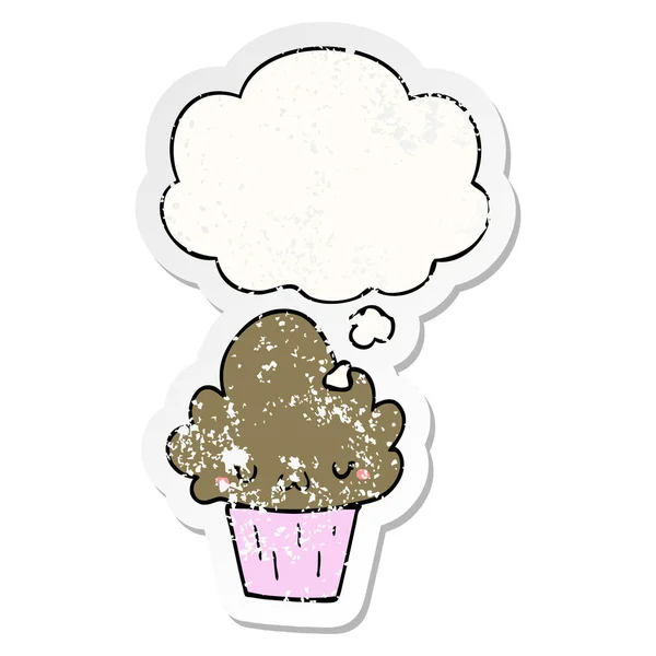 Cartone animato cupcake con viso e bolla di pensiero come un wor angosciato — Vettoriale Stock