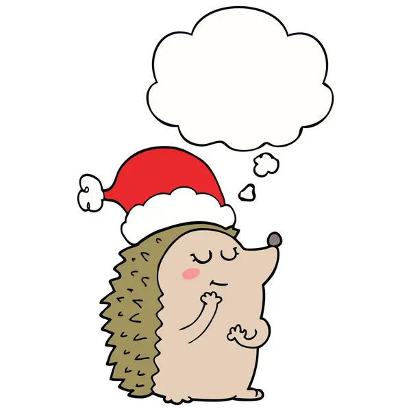 Cartoon hedgehog wearing christmas hat and thought bubble — Stock Vector