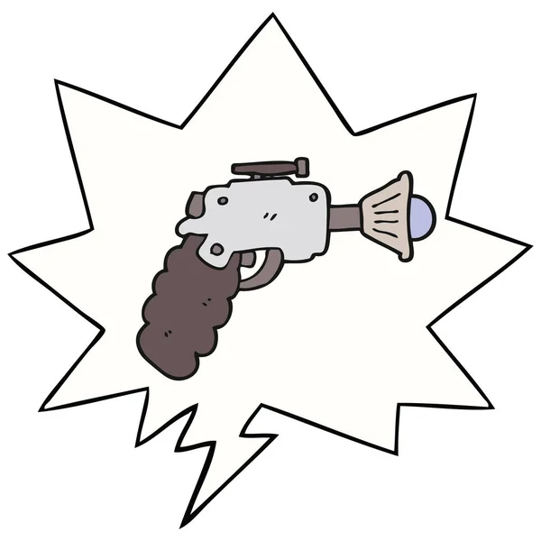 Pistolet à rayons de dessin animé et bulle de parole — Image vectorielle