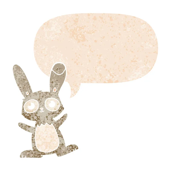 Cute cartoon rabbit and speech bubble in retro textured style — Stock Vector