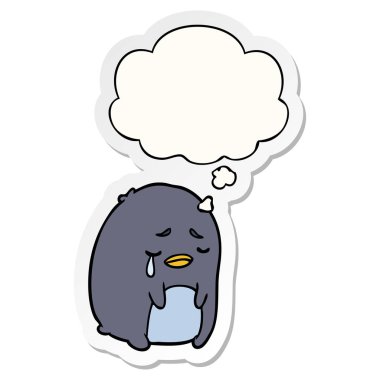 çizgi film ağlayan penguen ve baskılı bir etiket olarak kabarcık düşünce