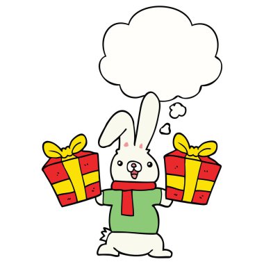noel hediyeleri ve düşünce balonu ile karikatür tavşan