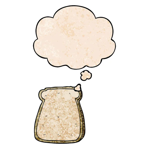 Kreslený krajíc chleba a myšlenková bublina v grungeové hlíně — Stockový vektor