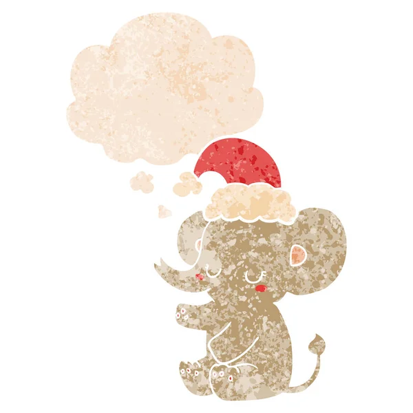 Cute christmas elephant and thought bubble in retro textured sty — Stock Vector
