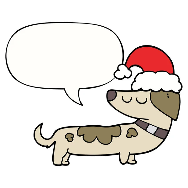 Chien de dessin animé portant chapeau de Noël et bulle de la parole — Image vectorielle