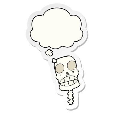 karikatür ürkütücü kafatası ve baskılı bir etiket olarak kabarcık düşünce