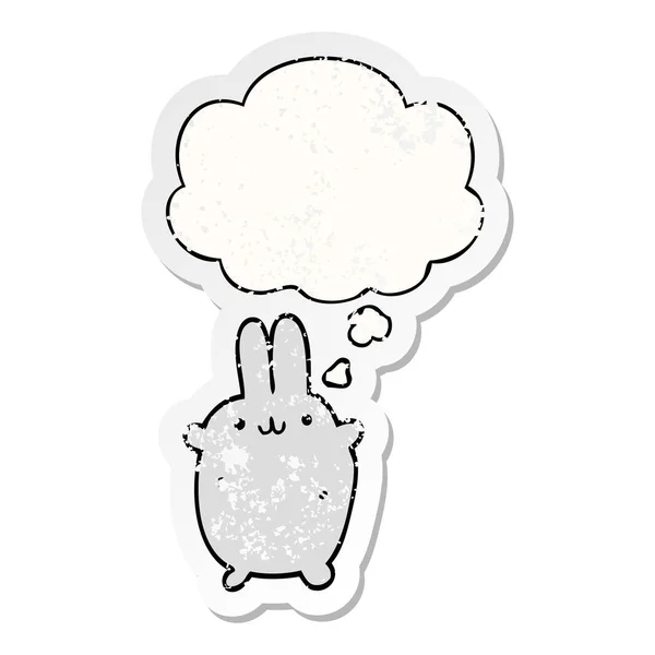 Kreslený králík a myšlenková bublina jako otřesený obnošený štítek — Stockový vektor