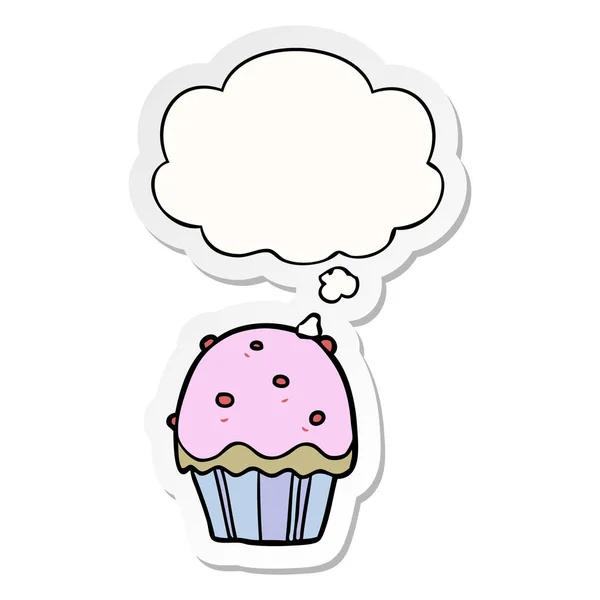 Karikatür cupcake ve baskılı bir etiket olarak kabarcık düşünce — Stok Vektör
