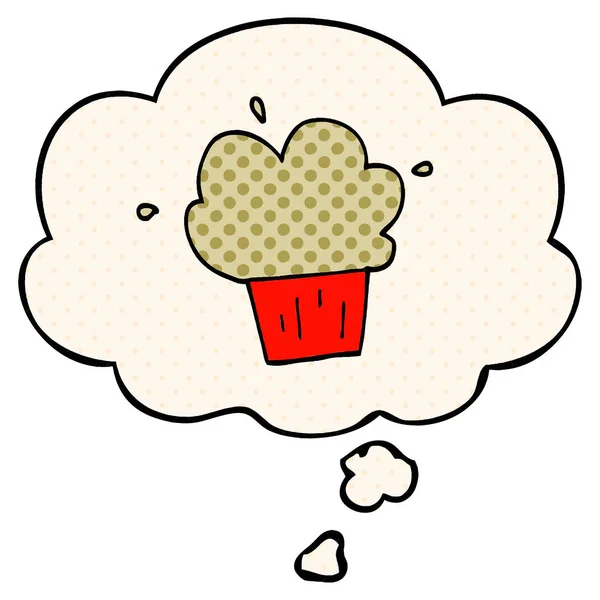 Tecknad muffin och tankebubbla i serietidningsstil — Stock vektor
