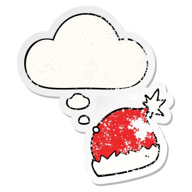 karikatür santa şapka ve sıkıntılı yıpranmış sticke olarak kabarcık düşünce