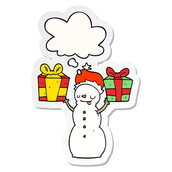 Cartoon snowman with present and thought bubble as a printed sti — Stock Vector