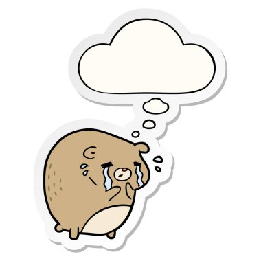 karikatür ağlayan ayı ve baskılı bir etiket olarak kabarcık düşünce