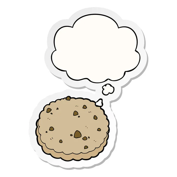 Cartoon biscuit en dacht Bubble als een gedrukte sticker — Stockvector