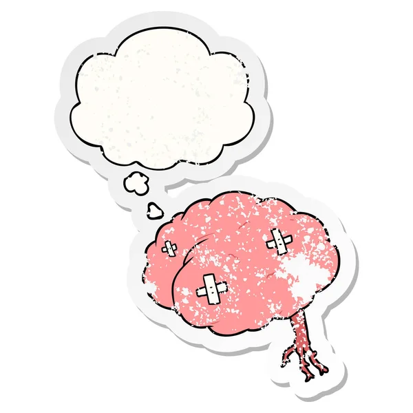 Cartoon injured brain and thought bubble as a distressed worn st — Stock Vector