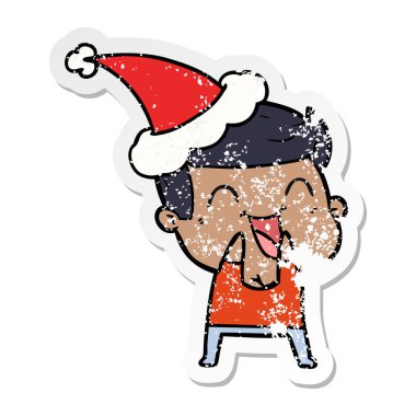 sıkıntılı etiket karikatür giyen Noel Baba şapkası gülen bir adam