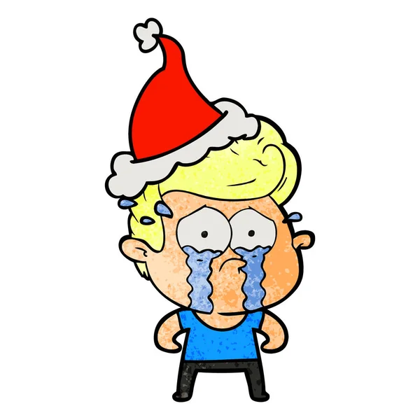 Dessin animé texturé d'un homme pleurant portant un chapeau de Père Noël — Image vectorielle