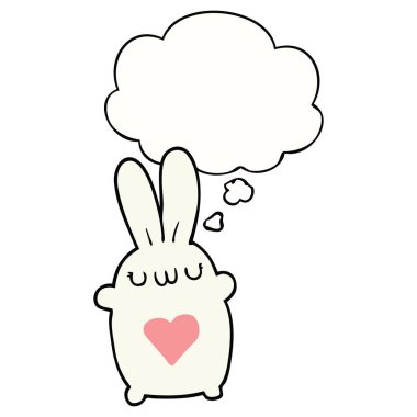 aşk kalp ve düşünce balonu ile sevimli karikatür tavşan