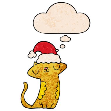 sevimli karikatür kedi noel şapka giyen ve gru kabarcık düşünce