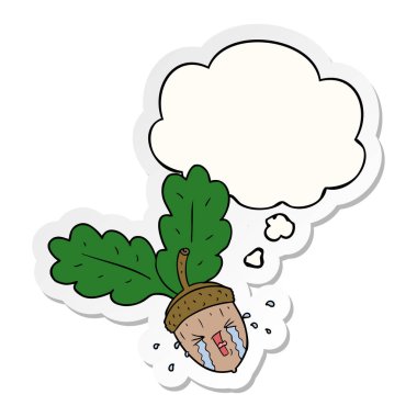 karikatür meşe palamudu ve baskılı bir etiket olarak düşünce balonu ağlama