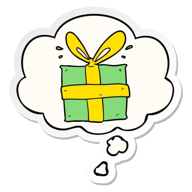 karikatür sarılmış hediye ve baskılı bir etiket olarak kabarcık düşünce