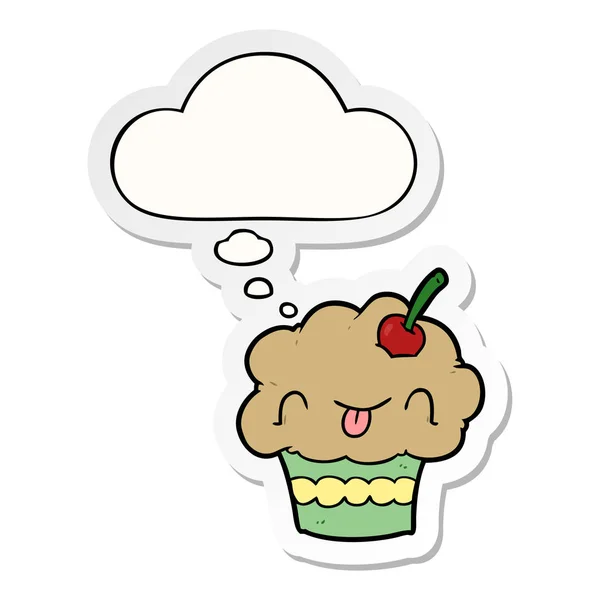 Cartoon cupcake en dacht Bubble als een gedrukte sticker — Stockvector