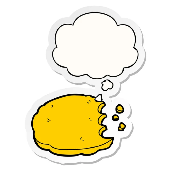 Cookie dessin animé et bulle de pensée comme un autocollant imprimé — Image vectorielle