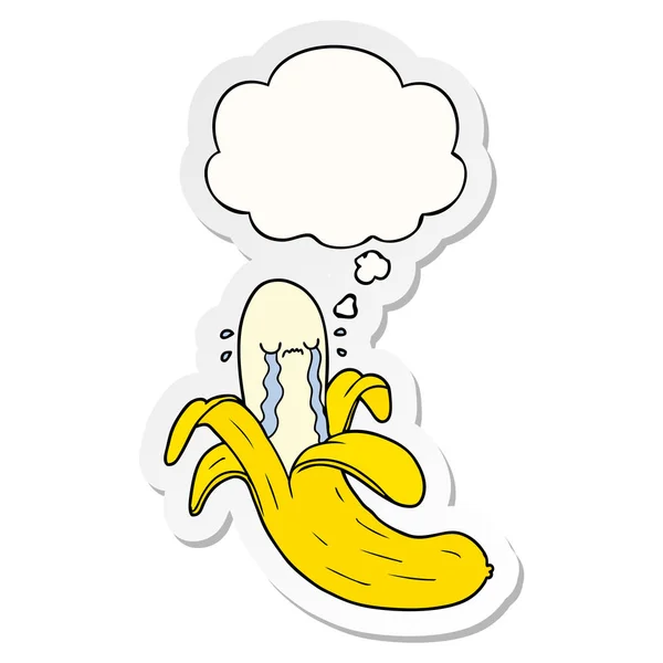 Tecknad Crying Banana och Thought Bubble som en tryckt klistermärke — Stock vektor