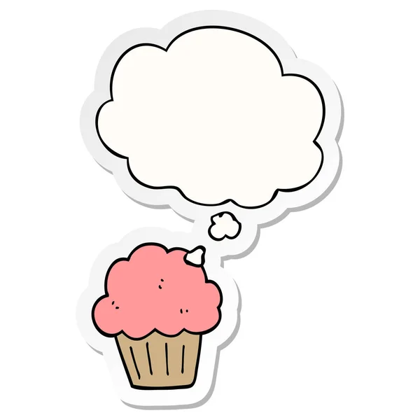 Karikatür muffin ve baskılı bir etiket olarak kabarcık düşünce — Stok Vektör