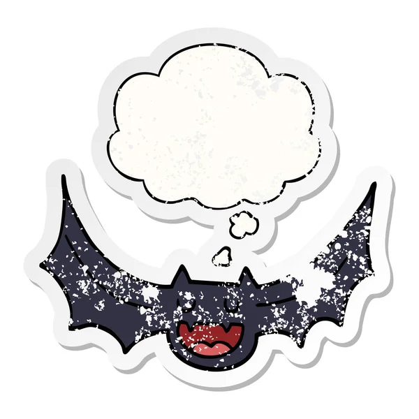 Cartoon bat and thought bubble as a distressed worn sticker — Stock Vector