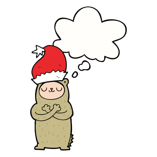 Urso dos desenhos animados usando chapéu de Natal e bolha de pensamento — Vetor de Stock