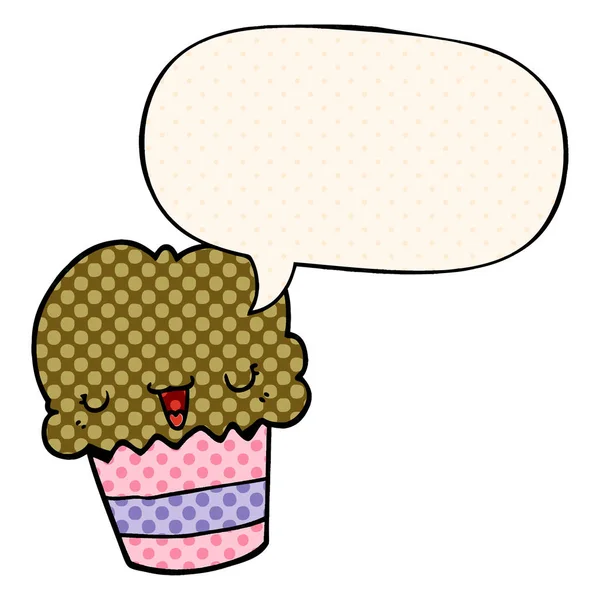 Cartone animato cupcake e faccia e la bolla vocale in stile fumetto — Vettoriale Stock